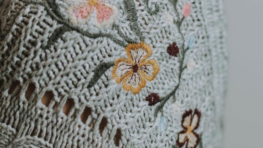 White And Pink Floral Textile