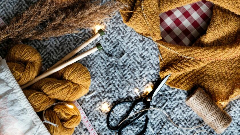 Sewing Materials On Gray Knit Textile