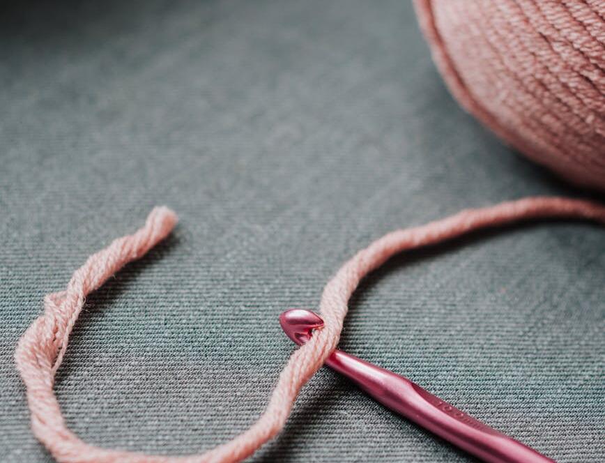 Pink Yarn And Crochet Hook